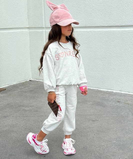 Ecru Sweatpants with Pink Glittery Graphics