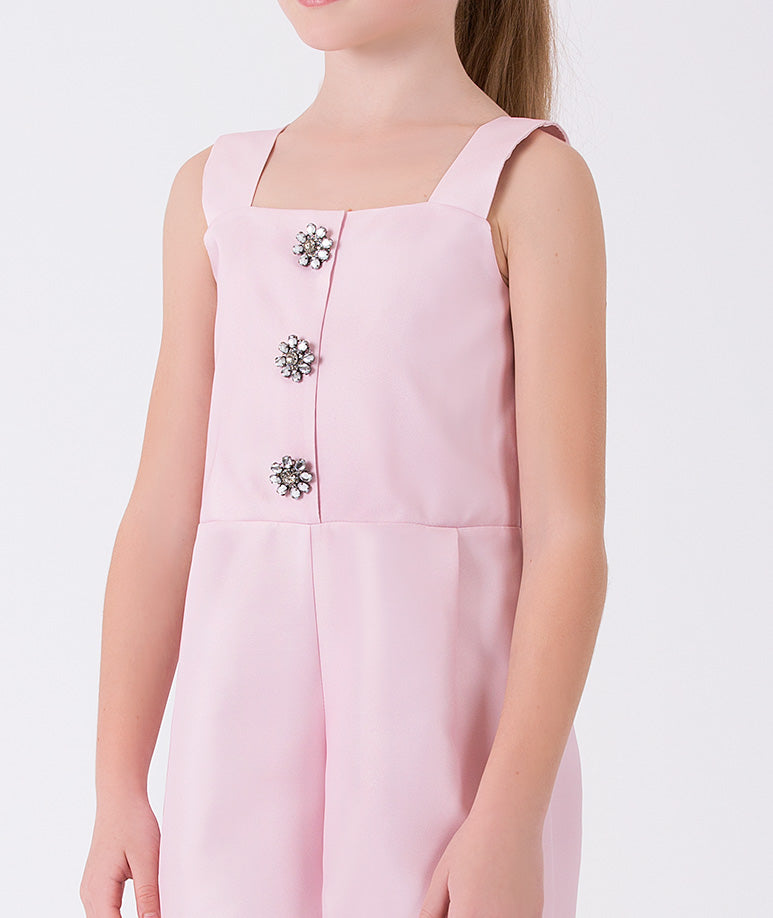 Pink jumper for girls by Mama Luma with shoulder straps with exquisite brooches in the front
