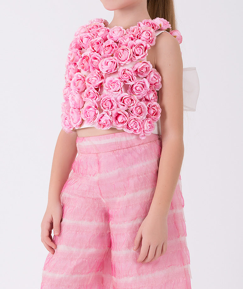 A pink blouse with 3D handplaced roses and pink comfy pants