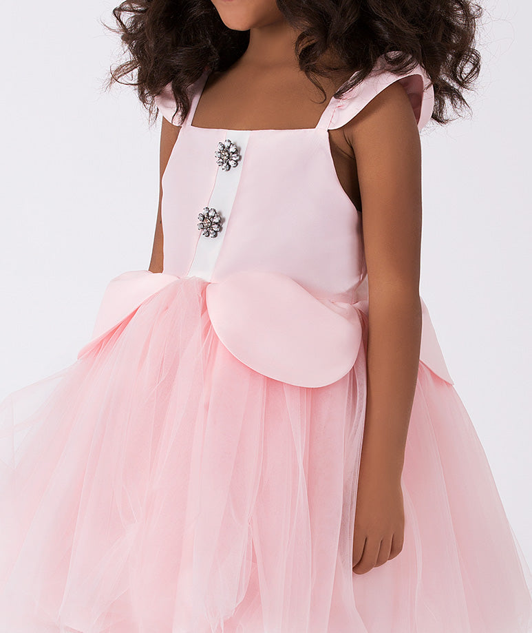 baby pink tulle dress with sparkling brooch buttons
