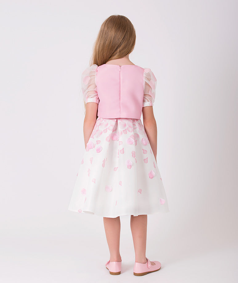 pink blouse with organza balloon sleeves and an ecru skirt with pink 3D rose petals 